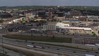 DX0002_174_022 - 5.7K aerial stock footage fly over I-29 toward hotel and office buildings in Downtown Sioux City, Iowa