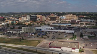 DX0002_174_024 - 5.7K aerial stock footage of office buildings in Downtown Sioux City, Iowa, seen during descent