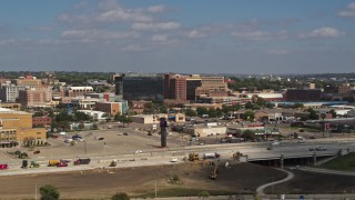 5.7K aerial stock footage stationary view of office buildings and fast food restaurants by highway in Downtown Sioux City, Iowa Aerial Stock Footage | DX0002_174_027