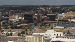 DX0002_174_034 - 5.7K aerial stock footage slowly passing office buildings in Downtown Sioux City, Iowa