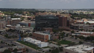 DX0002_175_004 - 5.7K aerial stock footage of Ho-Chunk Centre and nearby office buildings, Downtown Sioux City, Iowa