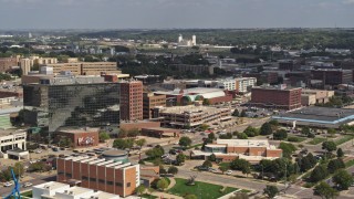 DX0002_175_009 - 5.7K aerial stock footage of convention center, Ho-Chunk Centre, and office buildings, Downtown Sioux City, Iowa