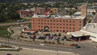 DX0002_175_014 - 5.7K aerial stock footage flying away from the Hard Rock Hotel and Casino, Downtown Sioux City, Iowa