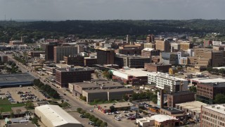 DX0002_175_021 - 5.7K aerial stock footage flying by office buildings and the convention center, Downtown Sioux City, Iowa