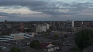 5.7K aerial stock footage flyby and away from the city's downtown area at twilight, Downtown Sioux Falls, South Dakota Aerial Stock Footage | DX0002_176_034