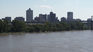 5.7K aerial stock footage ascend from river for view of the skyline and bridge, Downtown Memphis, Tennessee Aerial Stock Footage | DX0002_177_014