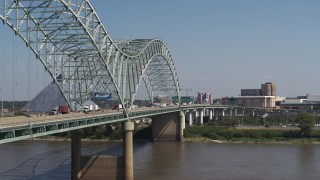 DX0002_177_030 - 5.7K aerial stock footage of cars crossing the bridge to Memphis, Tennessee