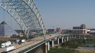 5.7K aerial stock footage of flying near cars crossing the bridge to Memphis, Tennessee Aerial Stock Footage | DX0002_177_031