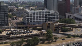 5.7K aerial stock footage of view of city hall in Downtown Memphis, Tennessee during descent Aerial Stock Footage | DX0002_177_033