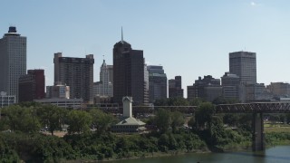 5.7K aerial stock footage view of an office tower with spire in Downtown Memphis, Tennessee during descent Aerial Stock Footage | DX0002_177_045