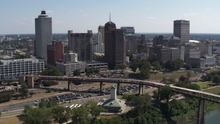 5.7K aerial stock footage of approaching and flying by office towers in Downtown Memphis, Tennessee skyline Aerial Stock Footage | DX0002_178_006