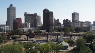 5.7K aerial stock footage reverse view of office towers in the Downtown Memphis, Tennessee skyline Aerial Stock Footage | DX0002_178_013