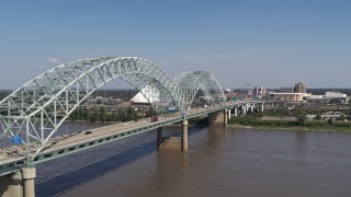 5.7K aerial stock footage of an orbit of light traffic traveling on the bridge, Memphis, Tennessee Aerial Stock Footage | DX0002_178_026