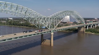 5.7K aerial stock footage approach light traffic and a sign on the bridge, Memphis, Tennessee Aerial Stock Footage | DX0002_178_027