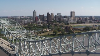 5.7K aerial stock footage reverse view of the city's skyline seen from the top of the bridge, Downtown Memphis, Tennessee Aerial Stock Footage | DX0002_178_032