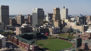 5.7K aerial stock footage of ascending toward tall office towers and baseball stadium in Downtown Memphis, Tennessee Aerial Stock Footage | DX0002_179_001