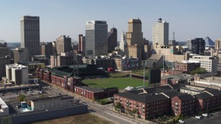 5.7K aerial stock footage descend with view of tall office towers and a baseball stadium in Downtown Memphis, Tennessee Aerial Stock Footage | DX0002_179_004