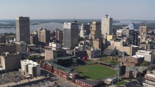 5.7K aerial stock footage descend with view of tall office towers and a baseball stadium in Downtown Memphis, Tennessee Aerial Stock Footage | DX0002_179_005