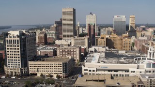 5.7K aerial stock footage of flying away from high-rise office towers in Downtown Memphis, Tennessee Aerial Stock Footage | DX0002_179_015