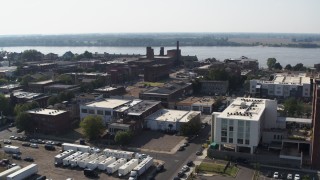 5.7K aerial stock footage descend with view of urban apartments and shops in Downtown Memphis, Tennessee Aerial Stock Footage | DX0002_179_028