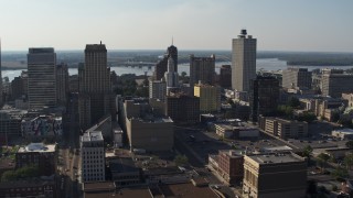 DX0002_180_004 - 5.7K aerial stock footage focus on Lincoln American Tower while flying by office buildings in Downtown Memphis, Tennessee