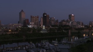 5.7K aerial stock footage of a view of downtown from across the river at twilight during descent, Downtown Memphis, Tennessee Aerial Stock Footage | DX0002_182_008