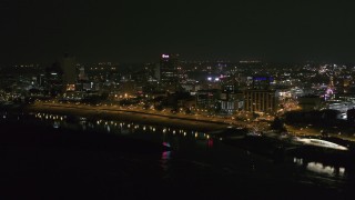 5.7K aerial stock footage of approaching office buildings and towers at night in Downtown Memphis, Tennessee Aerial Stock Footage | DX0002_182_026