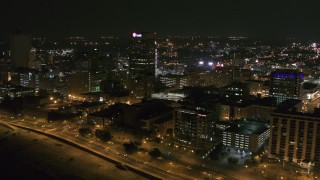 5.7K aerial stock footage of the One Commerce Square office tower at night in Downtown Memphis, Tennessee Aerial Stock Footage | DX0002_182_029