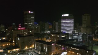 5.7K aerial stock footage of the One Commerce Square and First Tennessee Building office towers at night in Downtown Memphis, Tennessee Aerial Stock Footage | DX0002_182_030