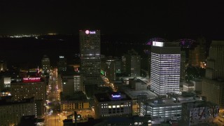 5.7K aerial stock footage approach One Commerce Square by First Tennessee Building at night in Downtown Memphis, Tennessee Aerial Stock Footage | DX0002_182_038