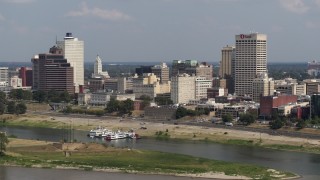 5.7K aerial stock footage of city buildings between office towers, Downtown Memphis, Tennessee Aerial Stock Footage | DX0002_183_024