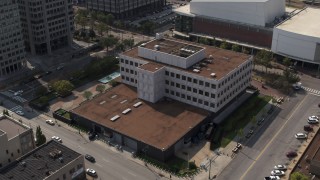 DX0002_183_036 - 5.7K aerial stock footage ascend and descend while focused on the Federal Reserve Bank in Downtown Memphis, Tennessee