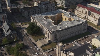 5.7K aerial stock footage approach courthouse by a church, tilt to bird's eye view, Downtown Memphis, Tennessee Aerial Stock Footage | DX0002_184_025