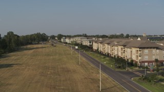 5.7K aerial stock footage of flying low past apartment buildings in Memphis, Tennessee Aerial Stock Footage | DX0002_185_001