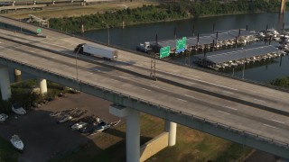 5.7K aerial stock footage of a stationary view of cars and trucks on the bridge in Memphis, Tennessee Aerial Stock Footage | DX0002_185_017