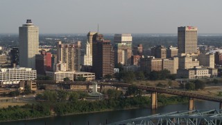 5.7K aerial stock footage stationary view of the skyline seen from the top of the bridge at sunset, Downtown Memphis, Tennessee Aerial Stock Footage | DX0002_185_023