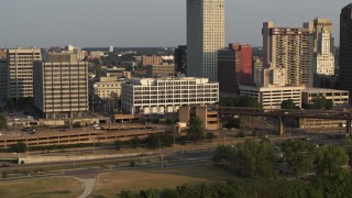 5.7K aerial stock footage focus on Memphis City Hall during descent at sunset, Downtown Memphis, Tennessee Aerial Stock Footage | DX0002_185_042