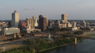 5.7K aerial stock footage of circling the downtown skyline at sunset, Downtown Memphis, Tennessee Aerial Stock Footage | DX0002_186_006