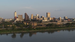 5.7K aerial stock footage orbit and approach museum at sunset, skyline in distance, Downtown Memphis, Tennessee Aerial Stock Footage | DX0002_186_015