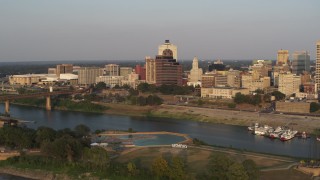 5.7K aerial stock footage stationary view of the downtown skyline at sunset, Downtown Memphis, Tennessee Aerial Stock Footage | DX0002_186_021