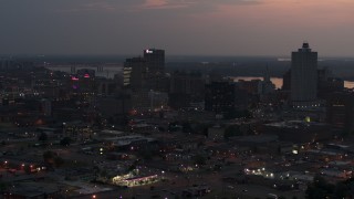 5.7K aerial stock footage of approaching the city's downtown skyline at twilight, Downtown Memphis, Tennessee Aerial Stock Footage | DX0002_187_005