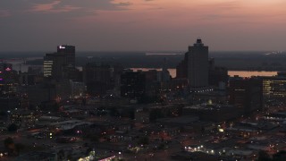 5.7K aerial stock footage of an orbit of the city's downtown skyline at twilight, Downtown Memphis, Tennessee Aerial Stock Footage | DX0002_187_007