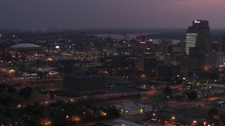 5.7K aerial stock footage of AutoZone Park baseball stadium at twilight, Downtown Memphis, Tennessee Aerial Stock Footage | DX0002_187_015