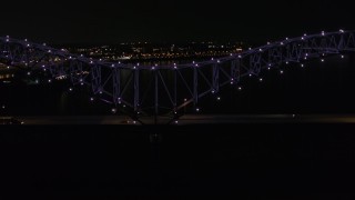 5.7K aerial stock footage of an orbit of the bridge with purple lights at night, Memphis, Tennessee Aerial Stock Footage | DX0002_187_031