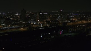 5.7K aerial stock footage of passing lights on the bridge at night to reveal Downtown Memphis, Tennessee Aerial Stock Footage | DX0002_187_053