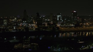 5.7K aerial stock footage of a wide orbit of the city's downtown skyline at night, Downtown Memphis, Tennessee Aerial Stock Footage | DX0002_187_058