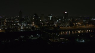 5.7K aerial stock footage of circling the city's downtown skyline at night, Downtown Memphis, Tennessee Aerial Stock Footage | DX0002_187_059