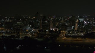 5.7K aerial stock footage orbit office tower and downtown skyline at night, Downtown Memphis, Tennessee Aerial Stock Footage | DX0002_187_062