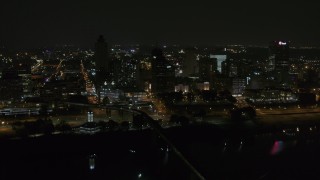 5.7K aerial stock footage approaching apartment and office high-rises at night, Downtown Memphis, Tennessee Aerial Stock Footage | DX0002_187_064