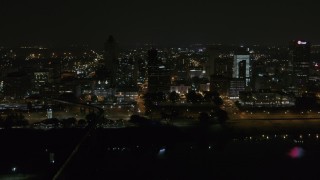 5.7K aerial stock footage of orbiting the city's downtown skyline at nighttime, Downtown Memphis, Tennessee Aerial Stock Footage | DX0002_187_069